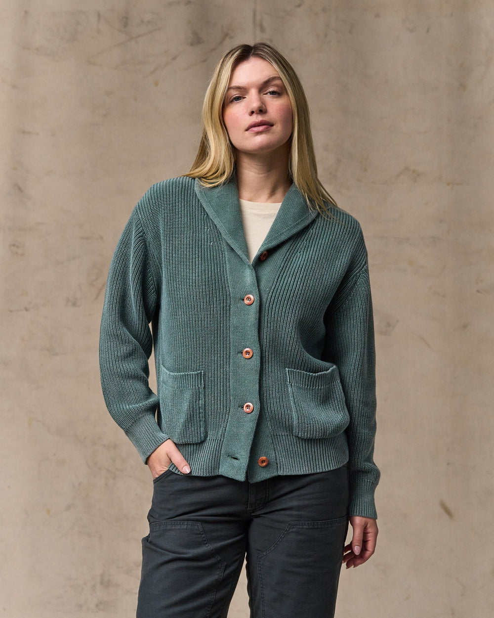 image of a model wearing Filson's Women's Cotton Shawl Neck Cardigan - Juniper
