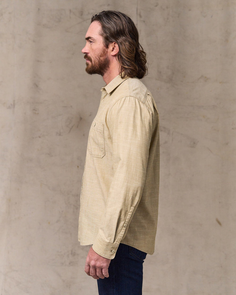 image of a model wearing Filson's Chambray Cpo Shirt - Tan