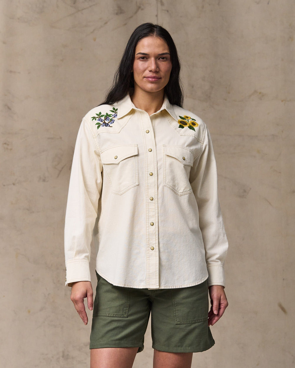 image of a model wearing Filson's Women's Embroidered Western Shirt - Natural Seed