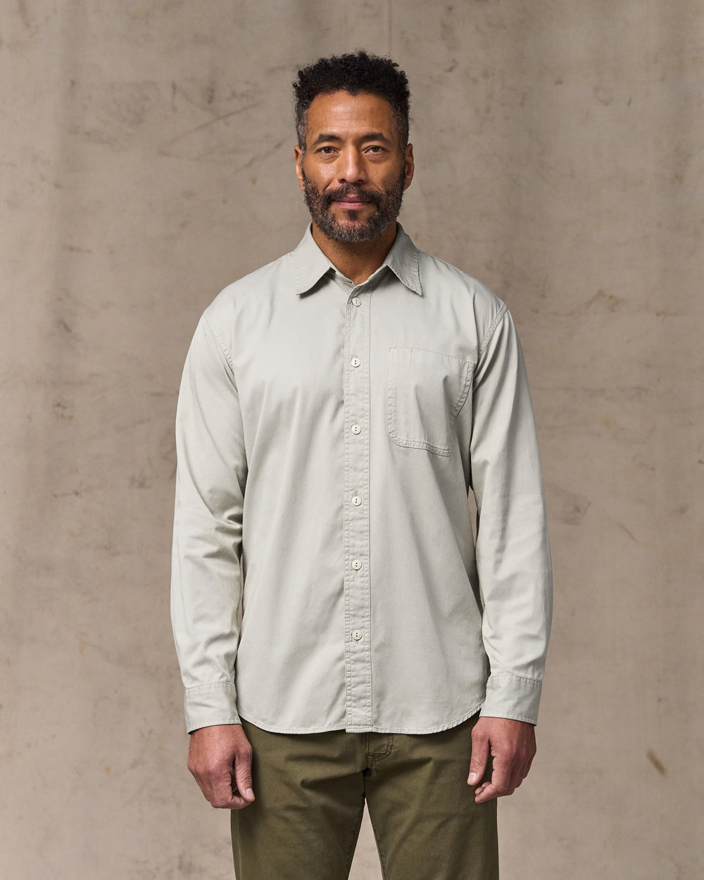 image of a model wearing Filson's 4.5-oz. Twill Shirt - Gray Sky