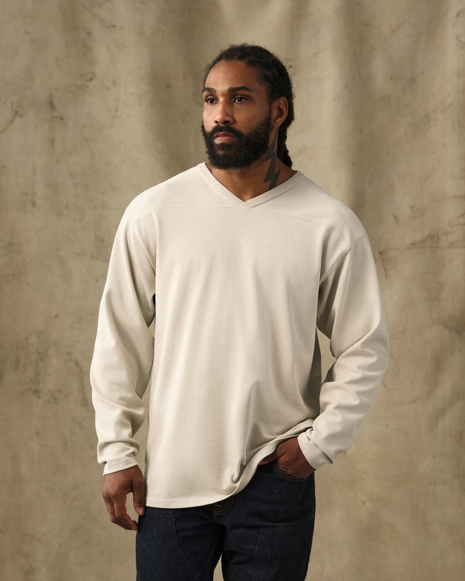 image of a model wearing Filson's Field Knit Sport Jersey - Oyster|Model is 5'10" wearing a size medium