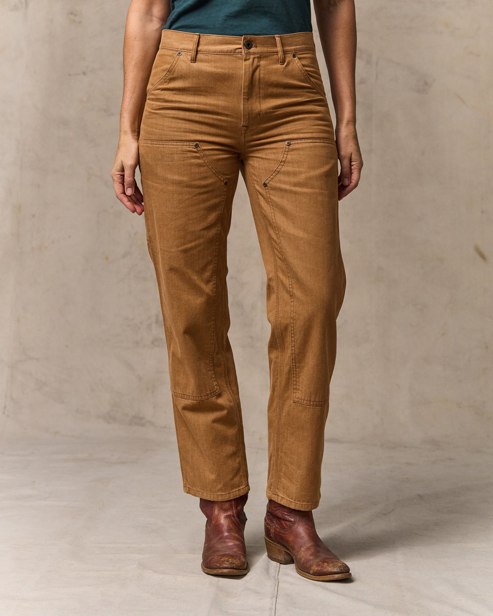 image of a model wearing Filson's Women's 11-oz. Work Jeans - Harvest Tan