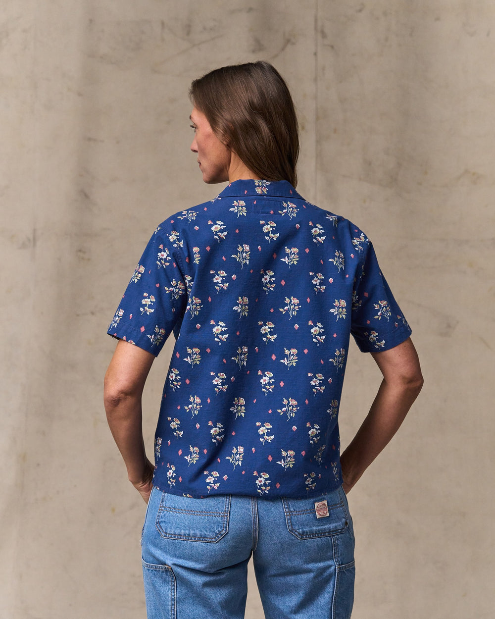 image of a model wearing Filson's Women's Camp Shirt - Indigo / Floral