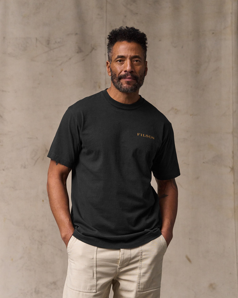 image of a model wearing Filson's Scenic Graphic T-shirt - Black