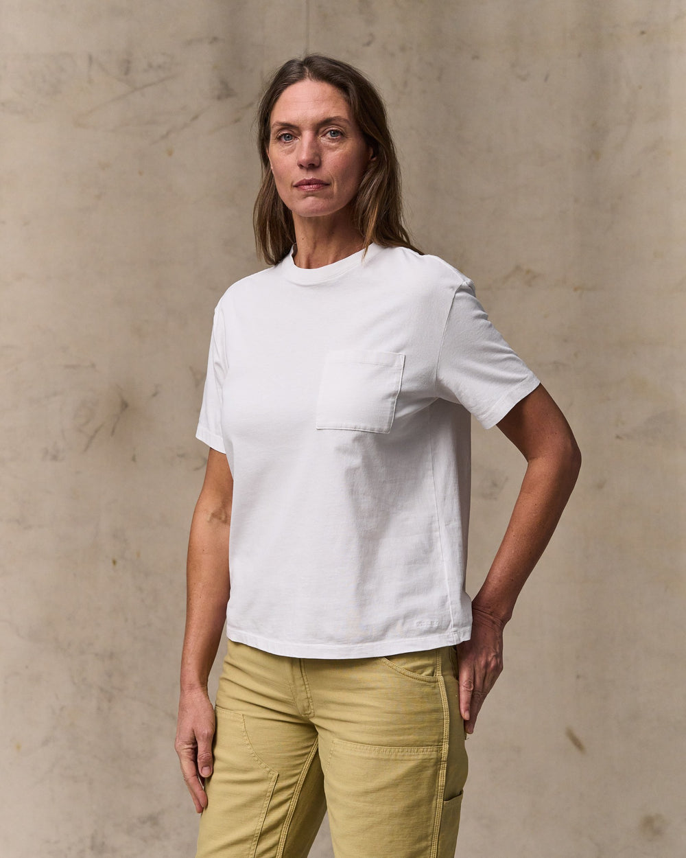 image of a model wearing Filson's Women's Short Sleeve Pocket Tee - Bright White