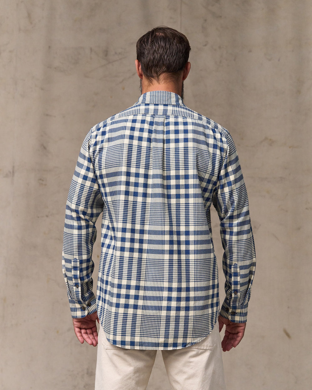 image of a model wearing Filson's Lightweight Alaskan Guide Shirt - Indigo Multi Plaid