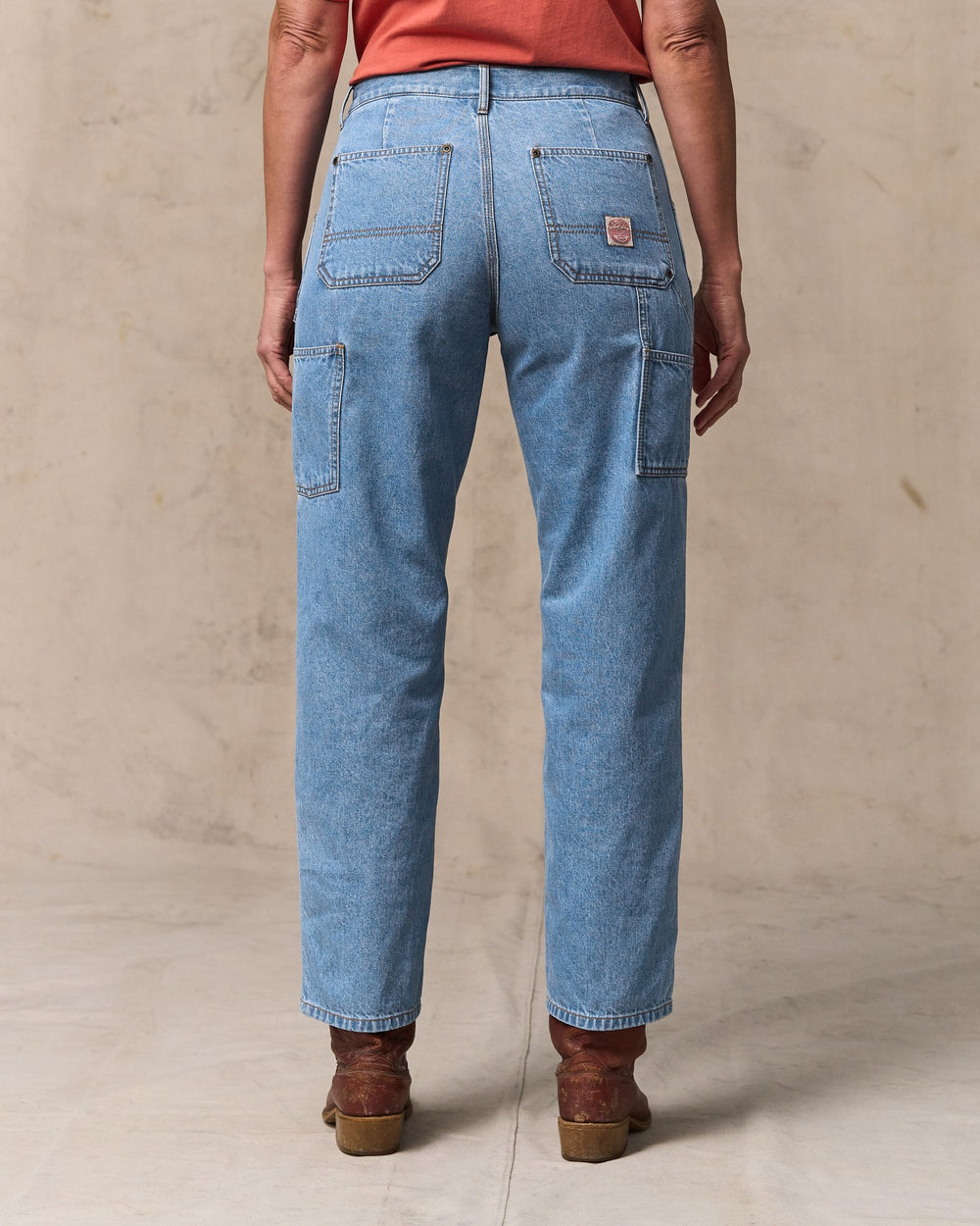 image of a model wearing Filson's Women's 11-oz. Work Jeans - Medium Indigo