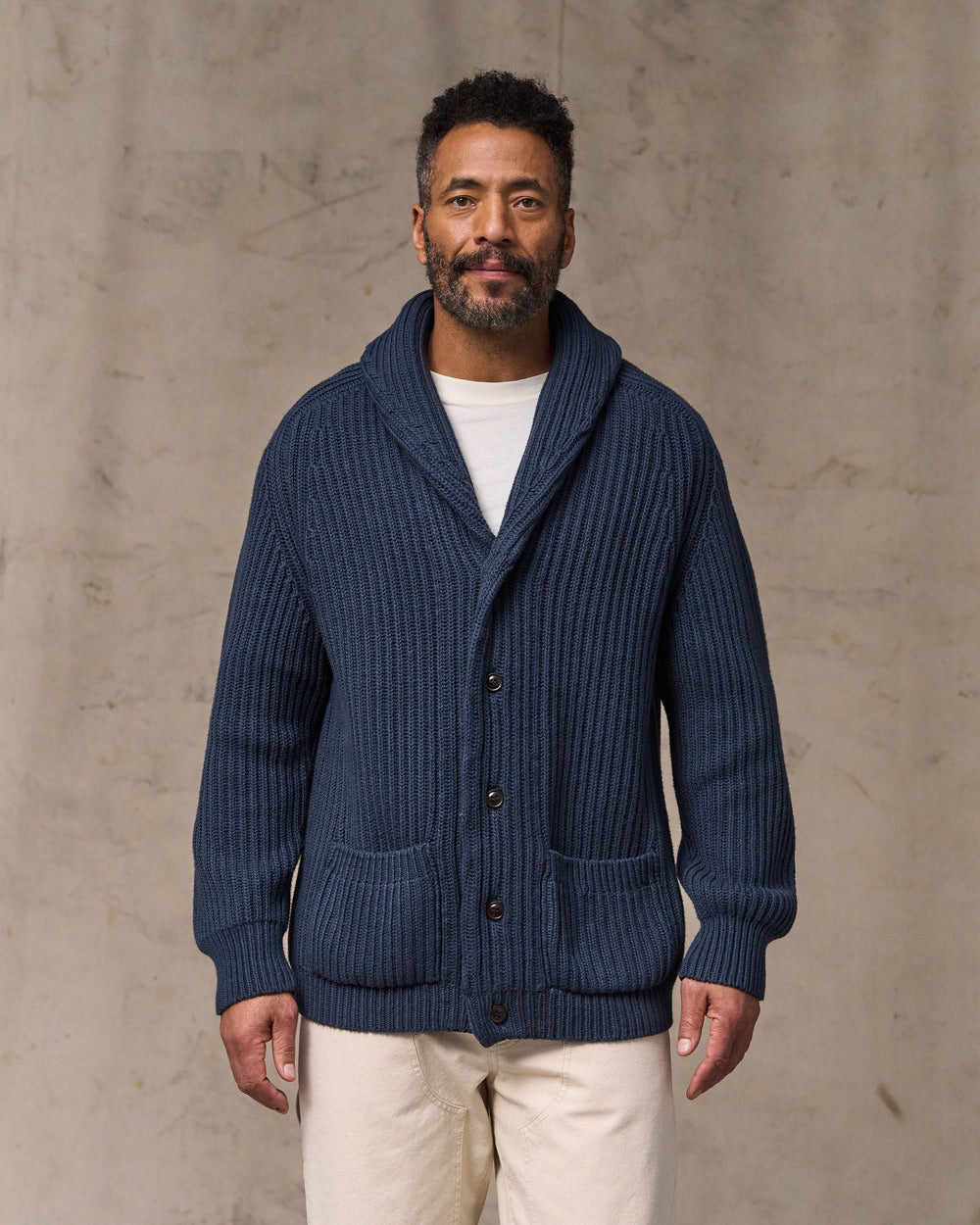 image of a model wearing Filson's Fisherman Rib Cotton Cardigan - Navy