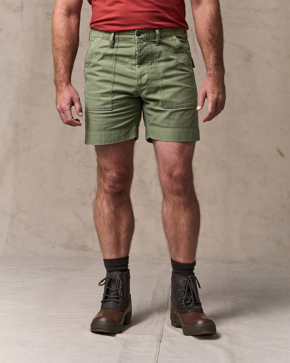 image of a model wearing Filson's Field Supply Shorts - Washed Fatigue Green