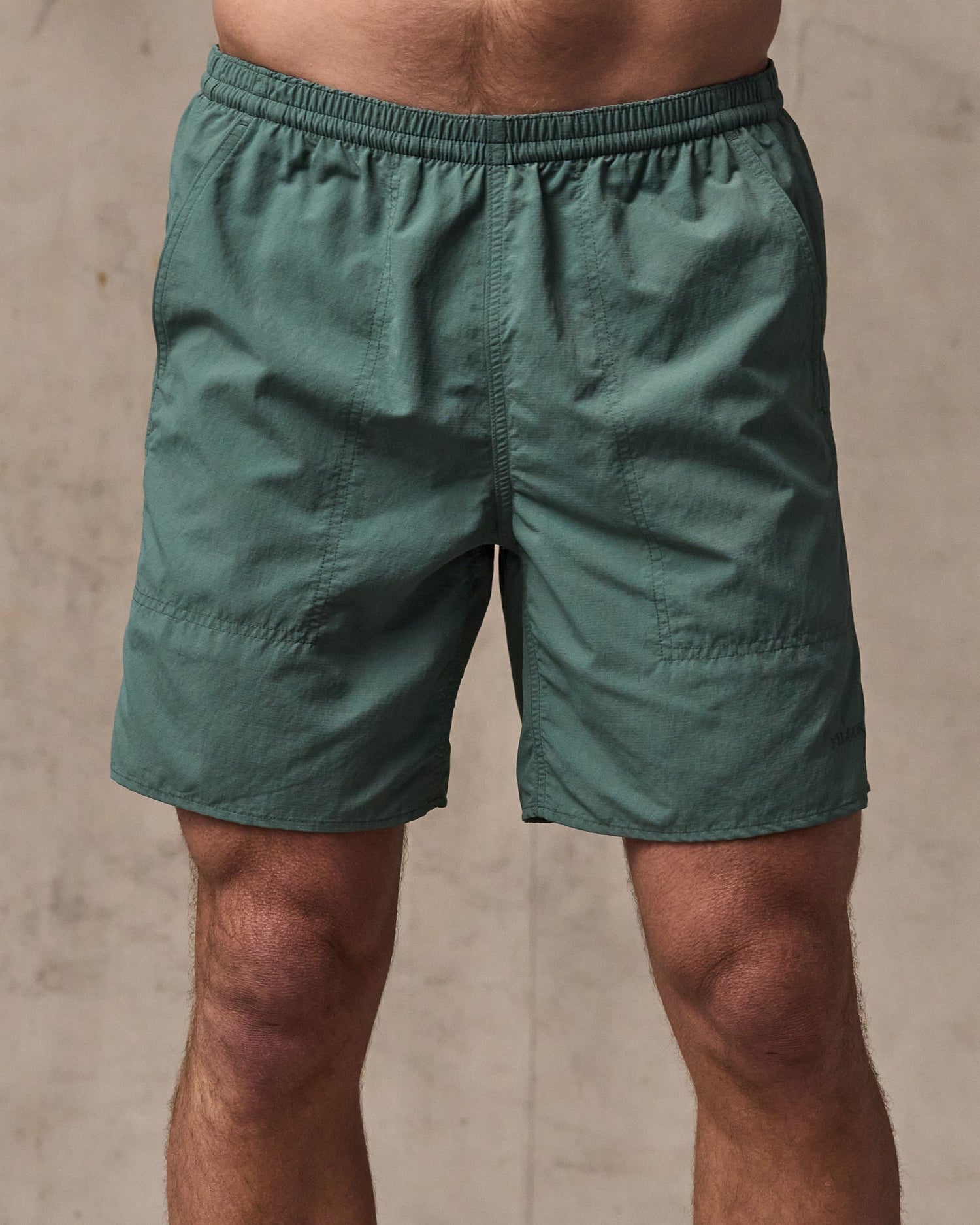 image of a model wearing Filson's Oxbow Lake Trunks - Dark Forest|Model is 6'1" wearing a size medium