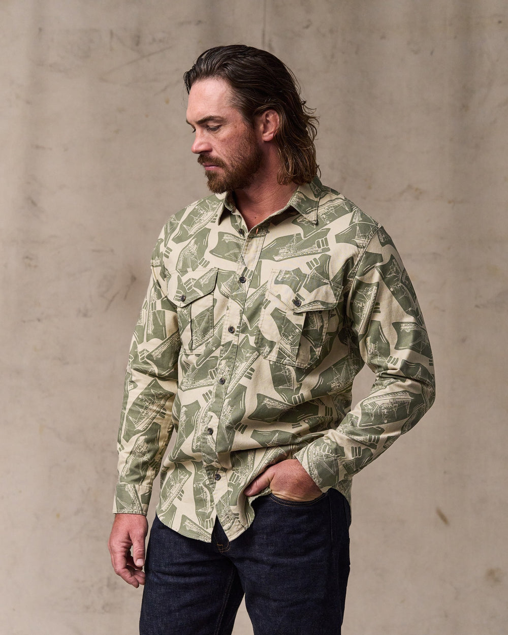 image of a model wearing Filson's Lightweight Alaskan Guide Shirt - Khaki / Print