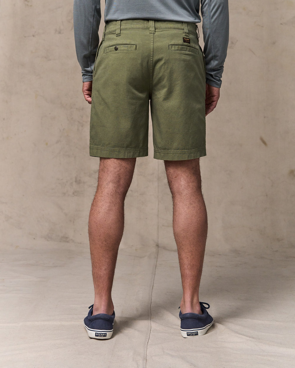 image of a model wearing Filson's Granite Mountain 9" Shorts - Burnt Olive
