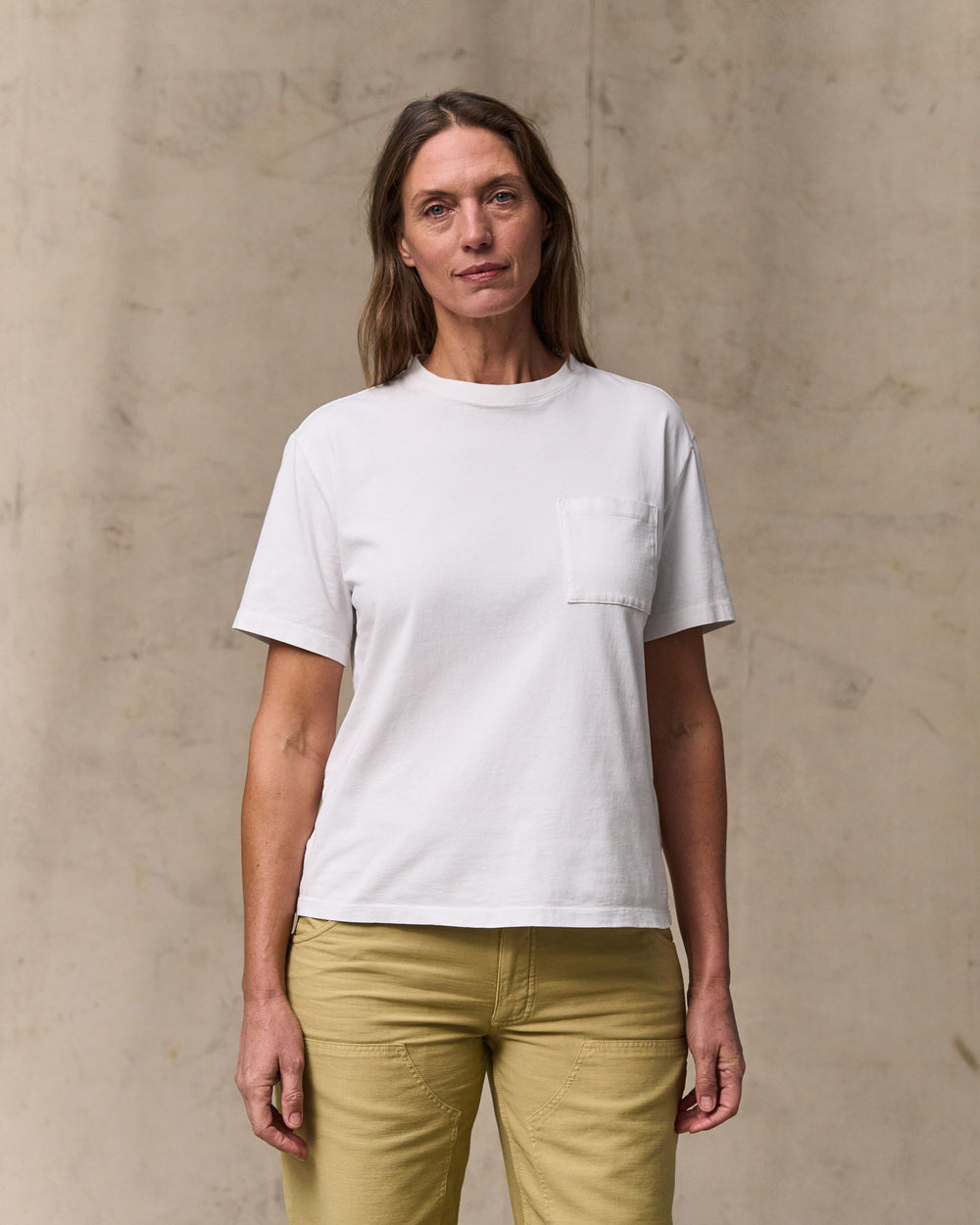 image of a model wearing Filson's Women's Short Sleeve Pocket Tee - Bright White
