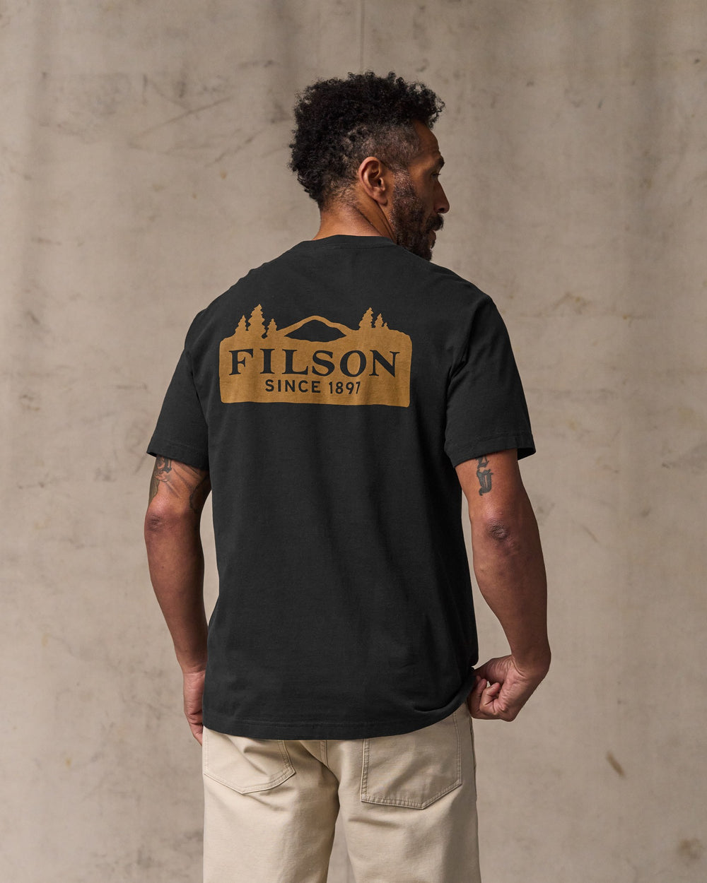 image of a model wearing Filson's Scenic Graphic T-shirt - Black