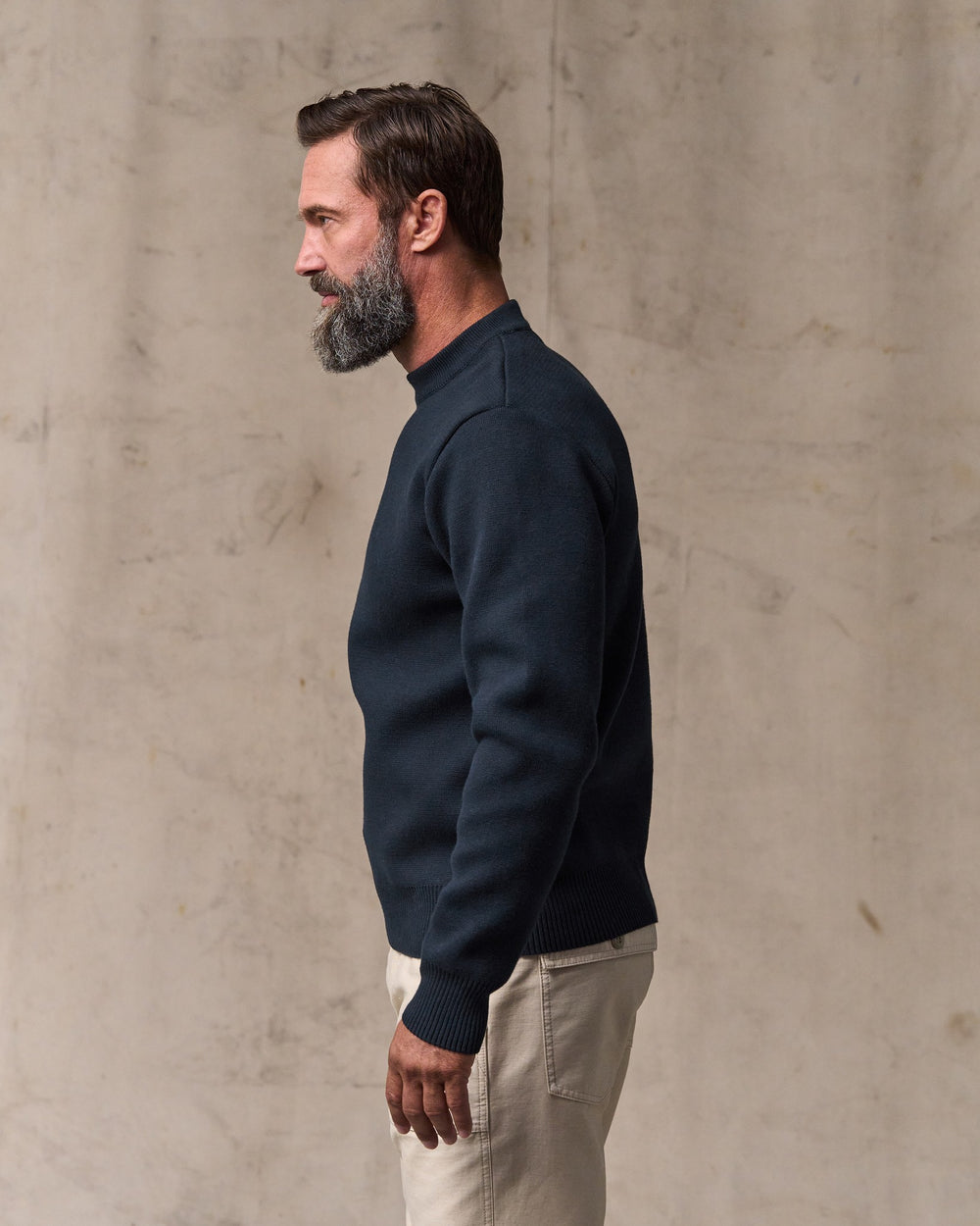 image of a model wearing Filson's Cotton Crewneck Guide Sweater - Dark Navy