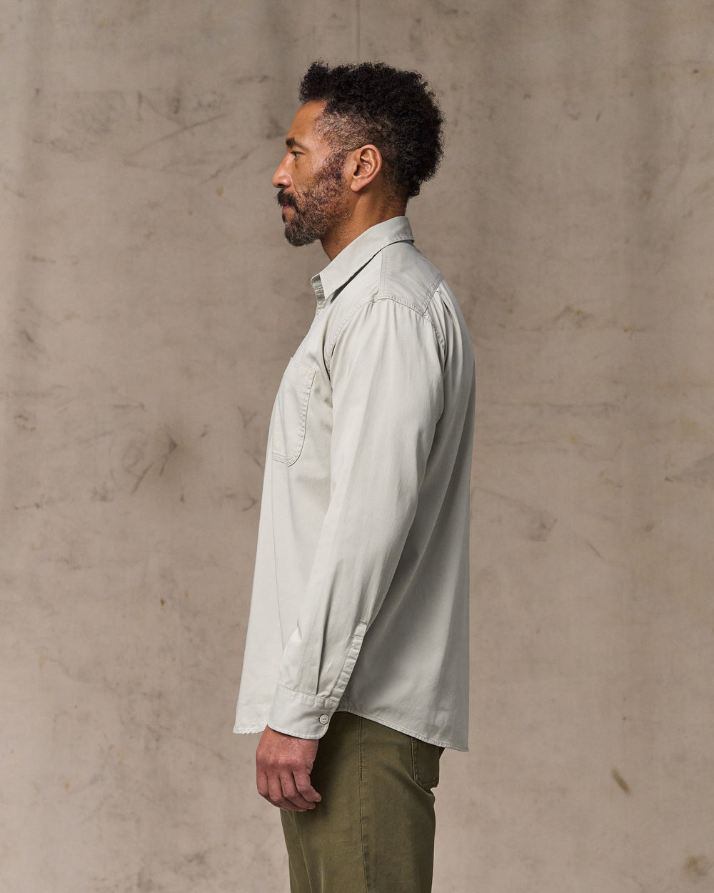 image of a model wearing Filson's 4.5-oz. Twill Shirt - Gray Sky