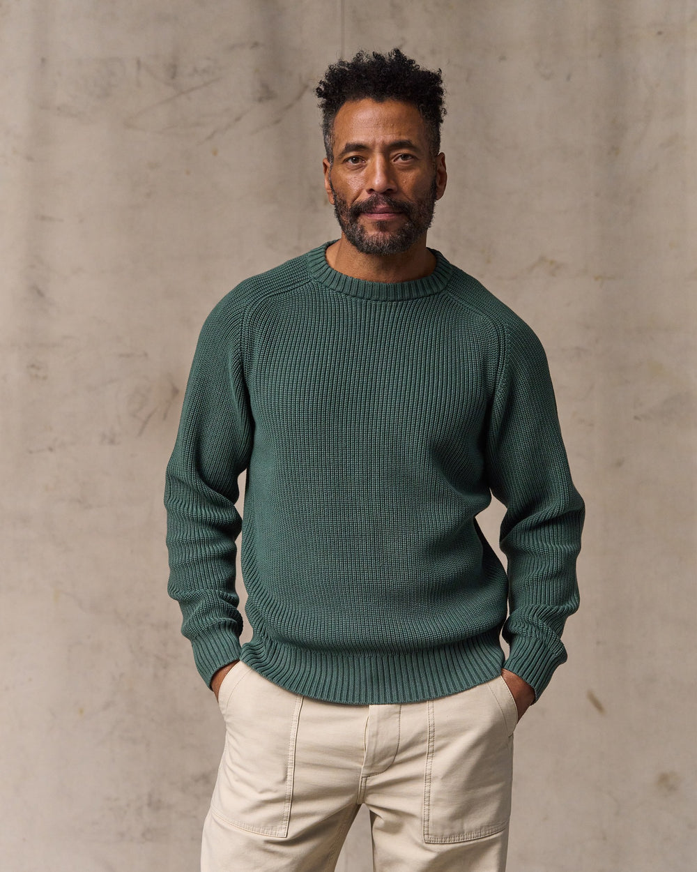 image of a model wearing Filson's Vintage Cotton Crewneck Sweater - Juniper