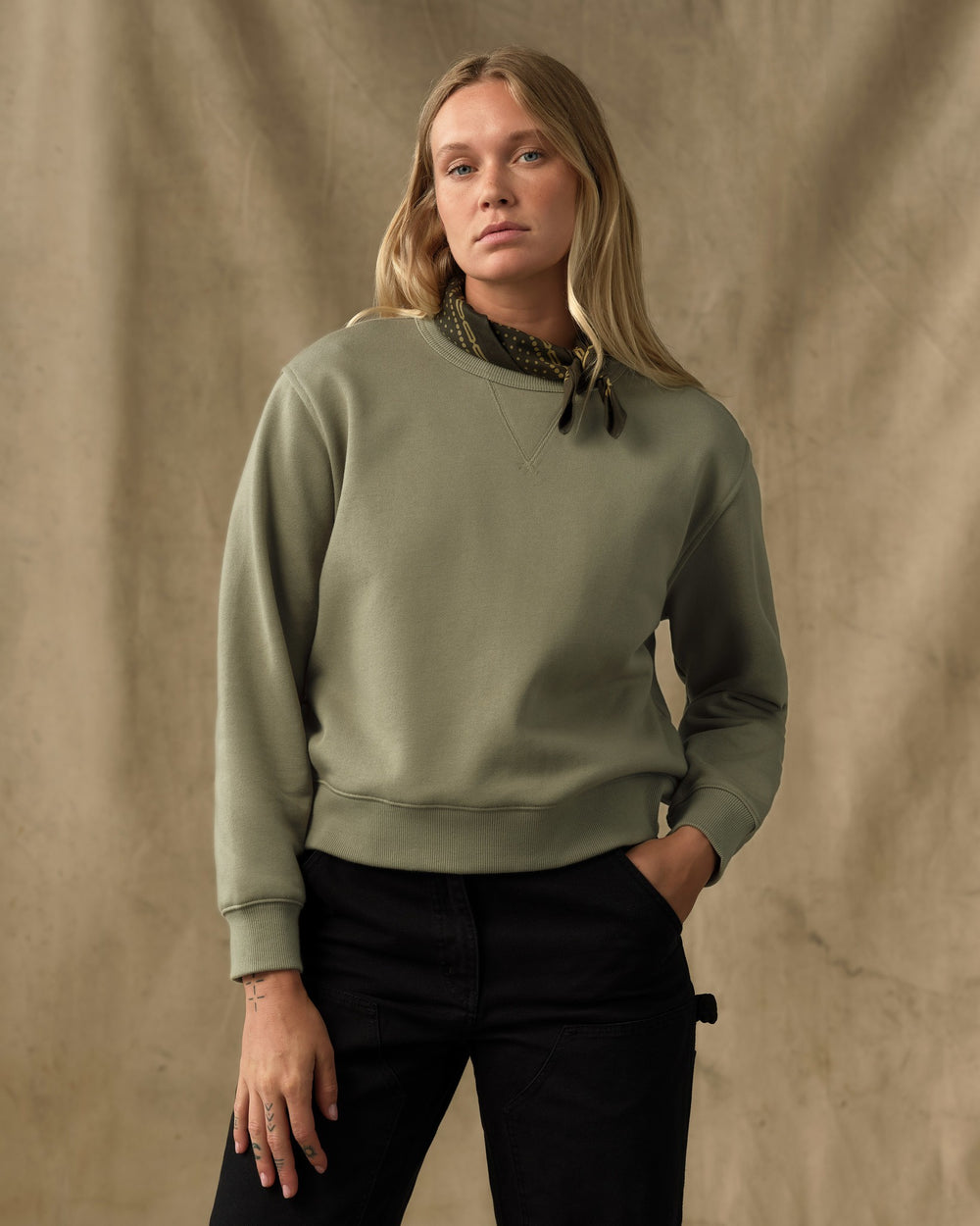 image of a model wearing Filson's Women's French Terry Crewneck - Olive Branch