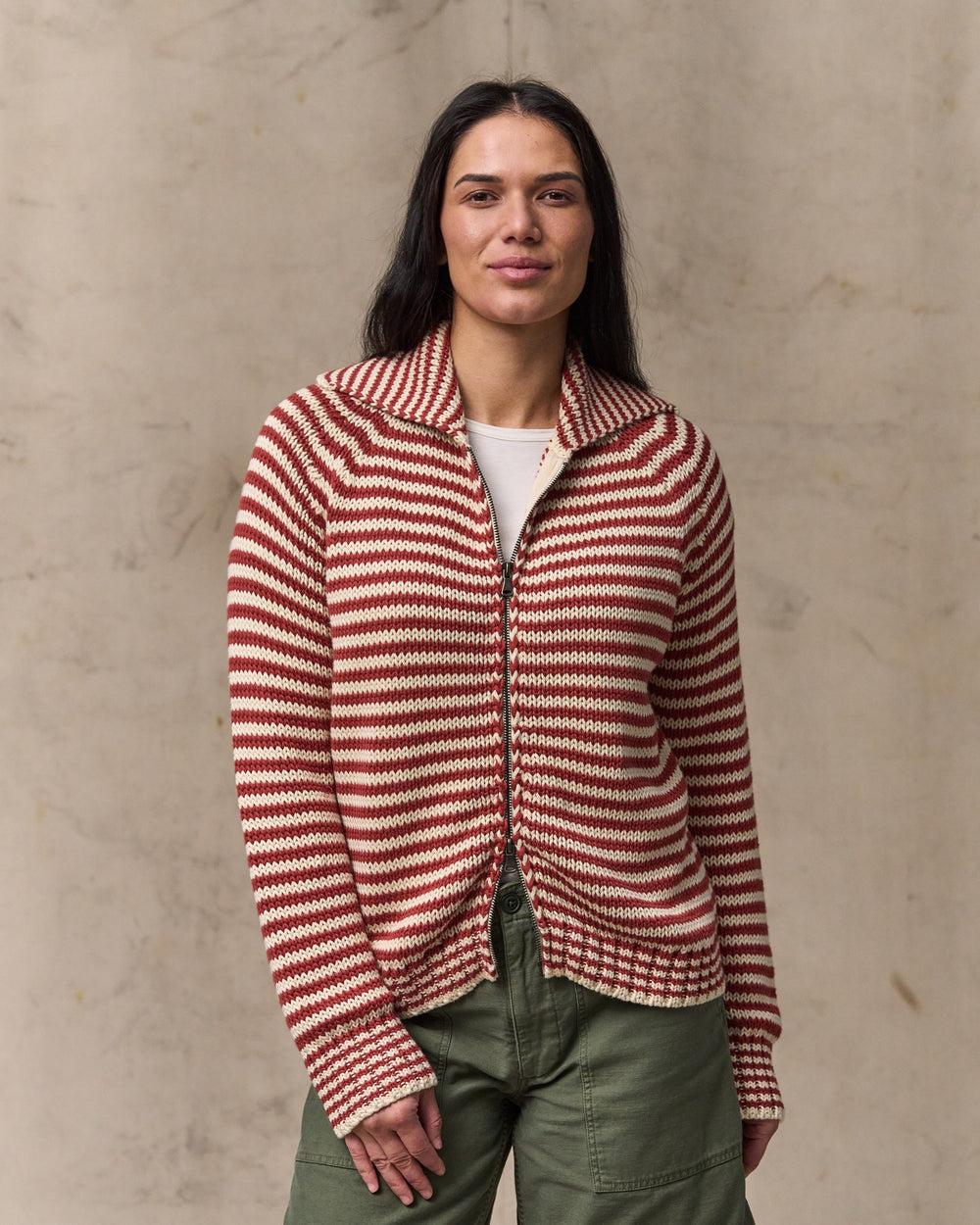 image of a model wearing Filson's Women's Cotton Full-zip Cardigan - Brick / Sand Stripe
