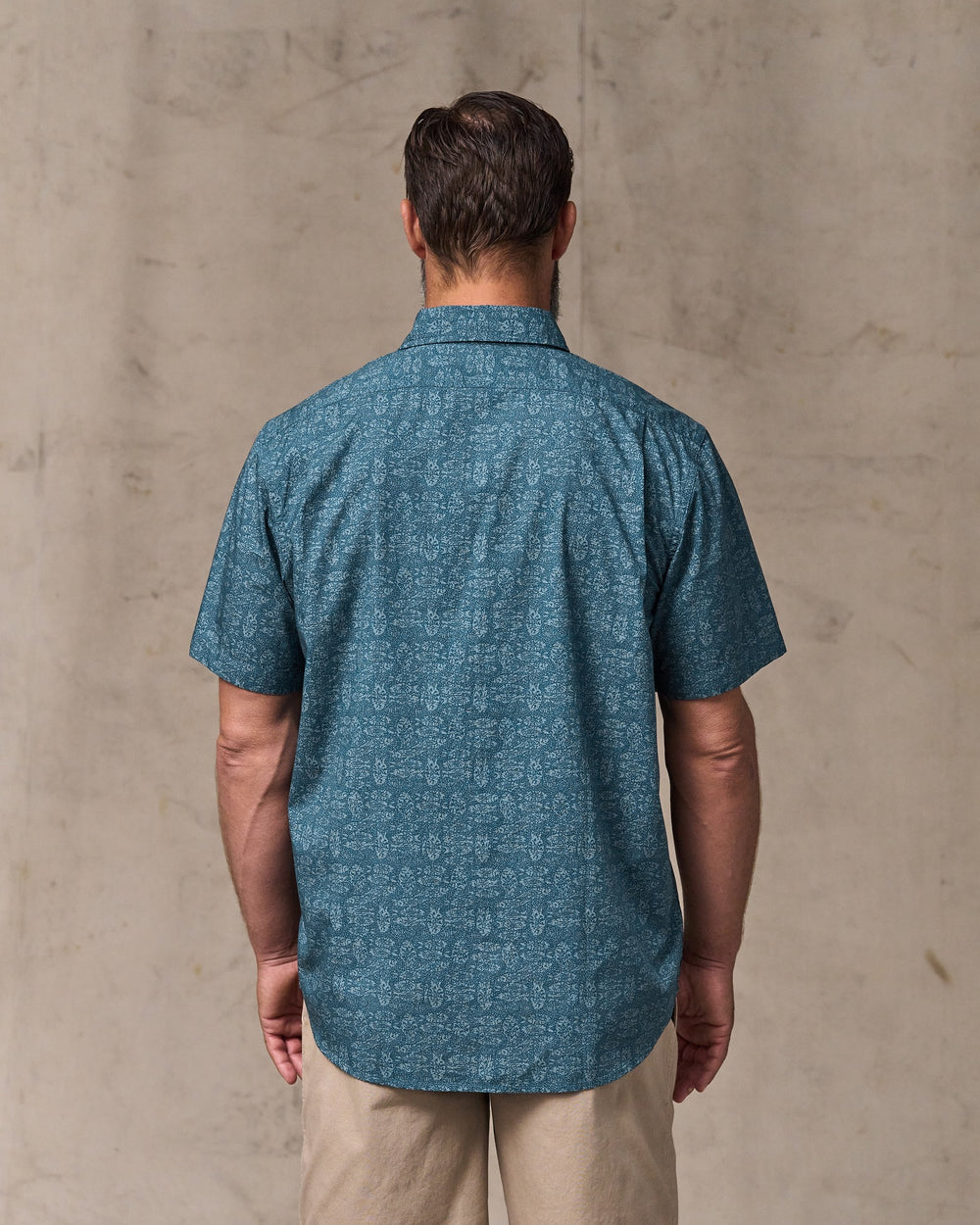 image of a model wearing Filson's Filson's Washed Short Sleeve Feather Cloth Shirt - Blue / Print
