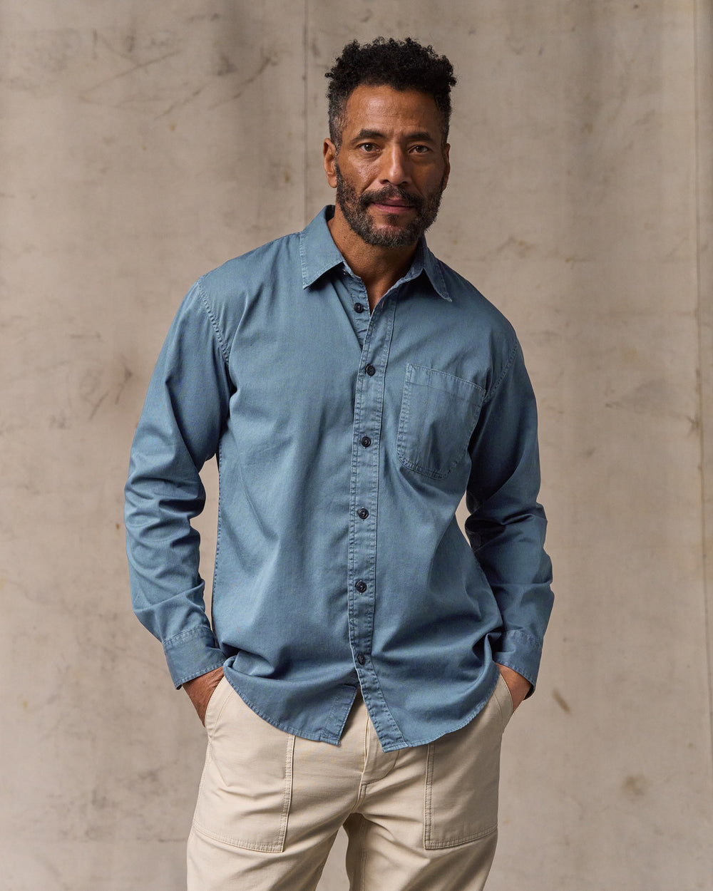 image of a model wearing Filson's 4.5-oz. Twill Shirt - Orion Blue