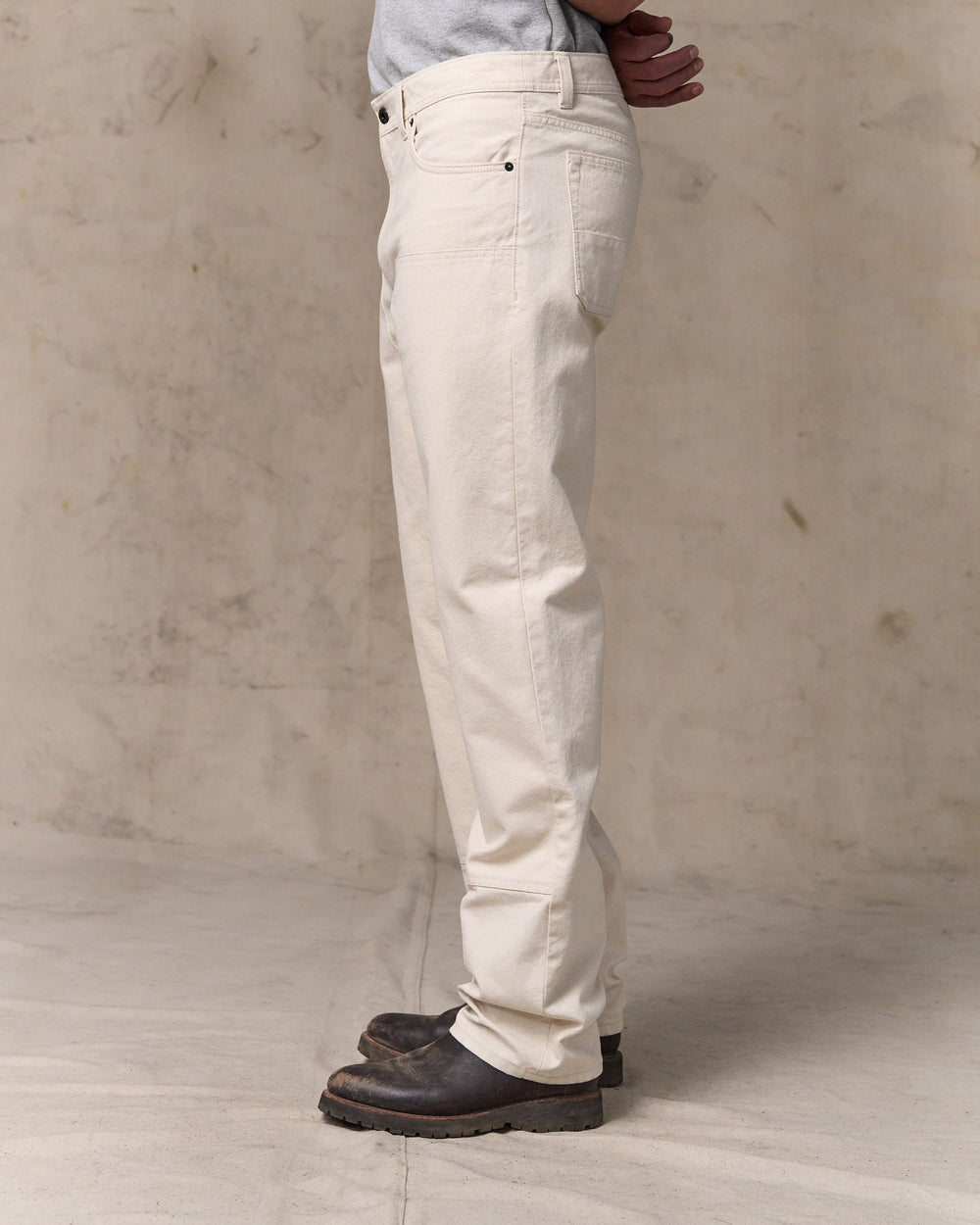 image of a model wearing Filson's Dry Tin Double Front Pants - Natural Seed
