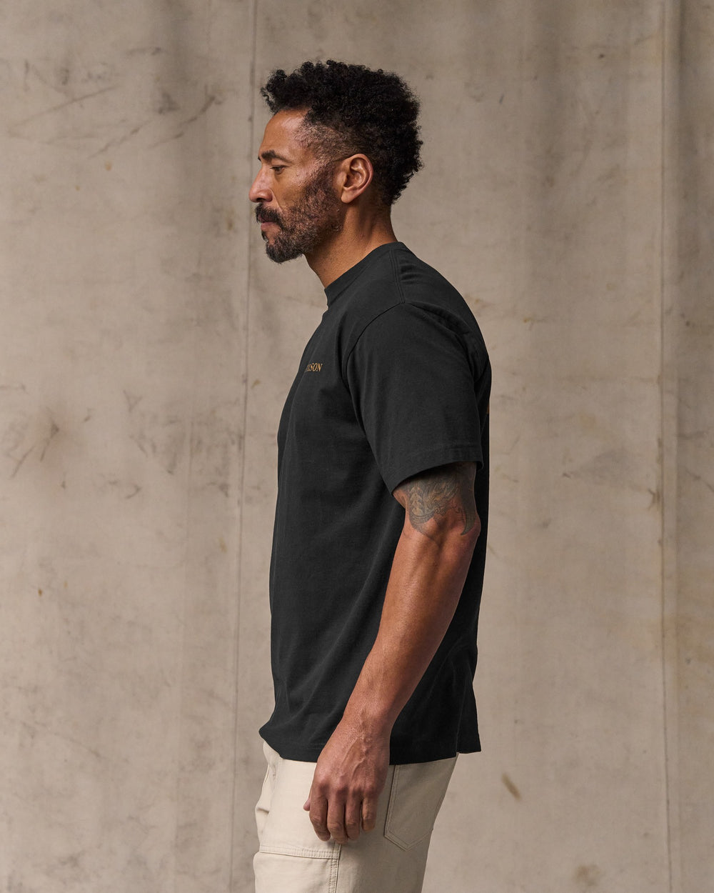 image of a model wearing Filson's Scenic Graphic T-shirt - Black