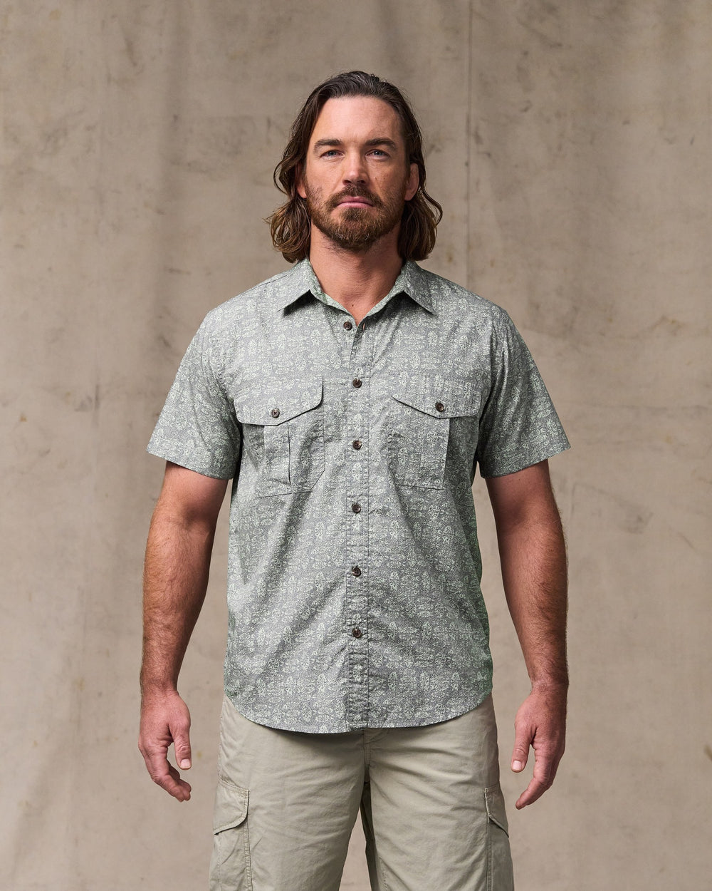 image of a model wearing Filson's Filson's Washed Short Sleeve Feather Cloth Shirt - Khaki / Print
