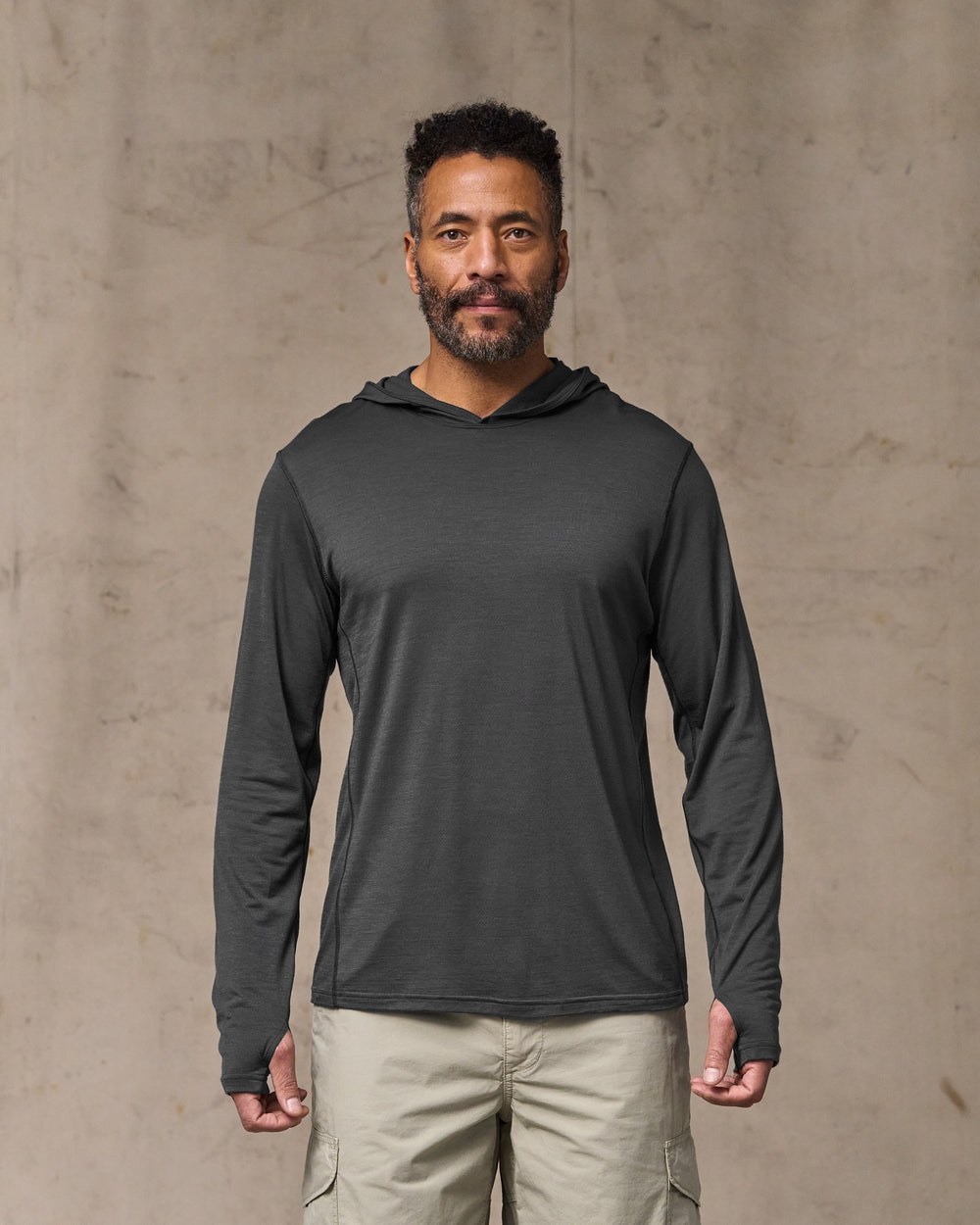image of a model wearing Filson's Wool-blend Upf Hoodie - Raven