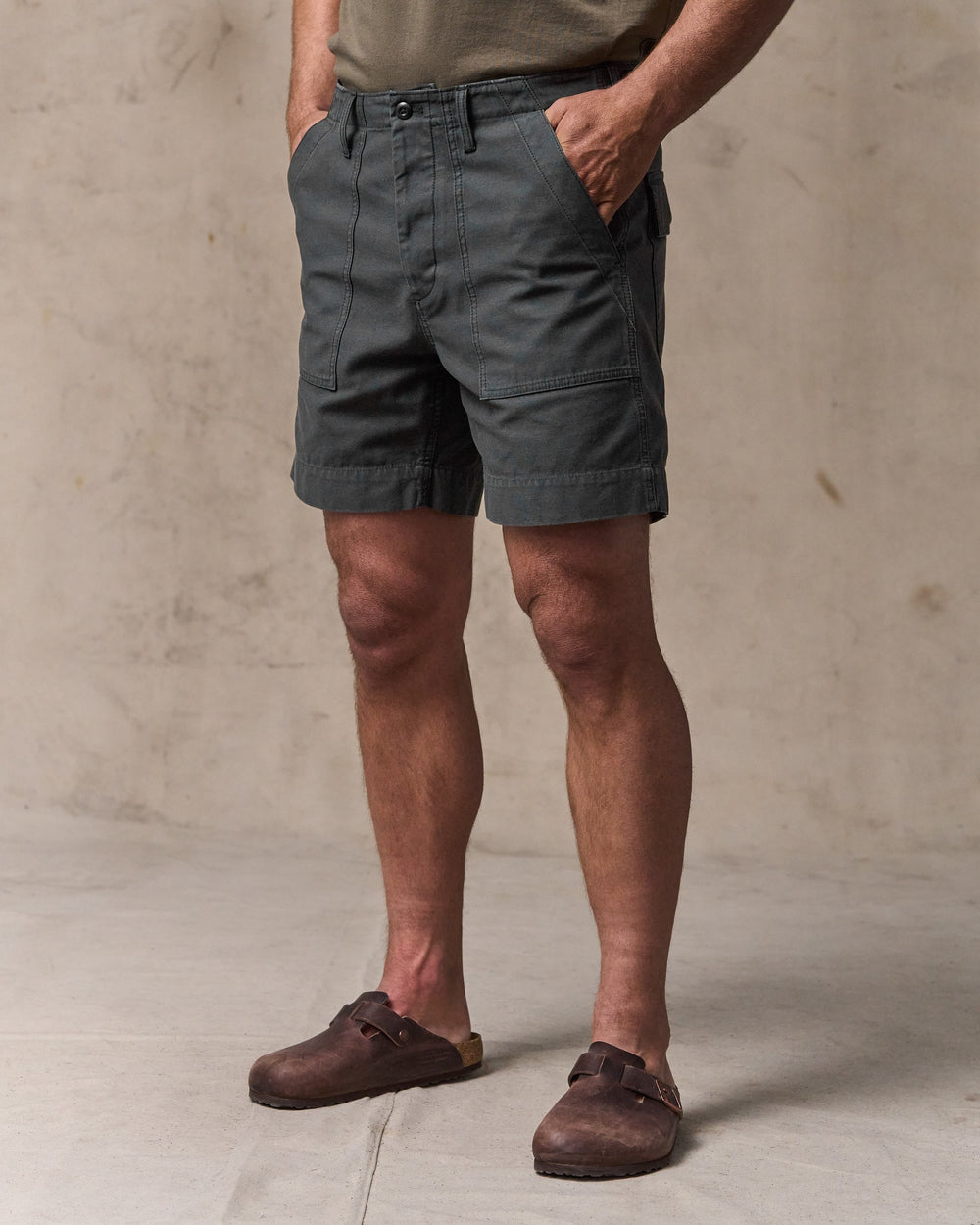image of a model wearing Filson's Field Supply Shorts - Washed Faded Black
