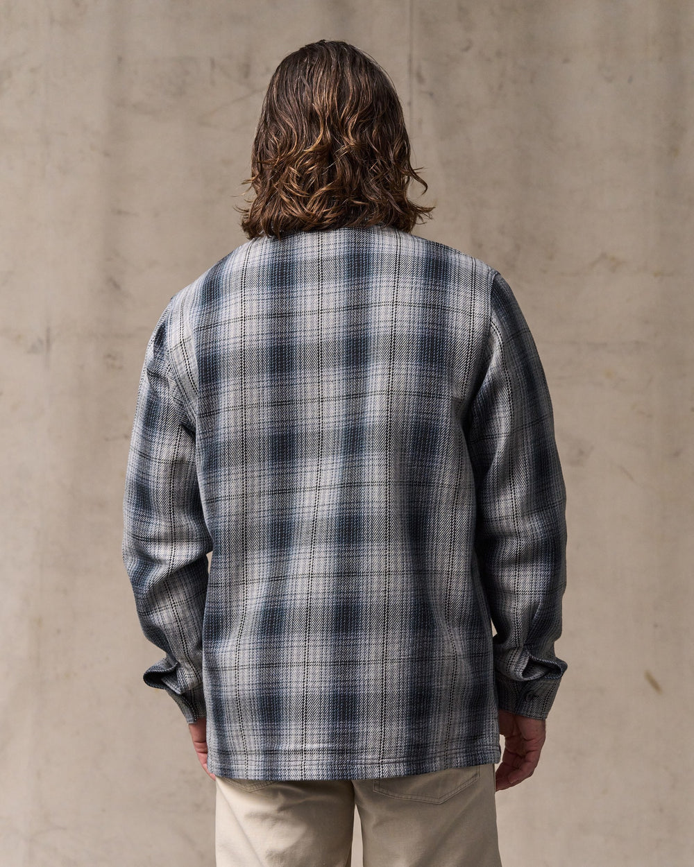 image of a model wearing Filson's Deer Island Jac-shirt - Slate / Gray Ombre