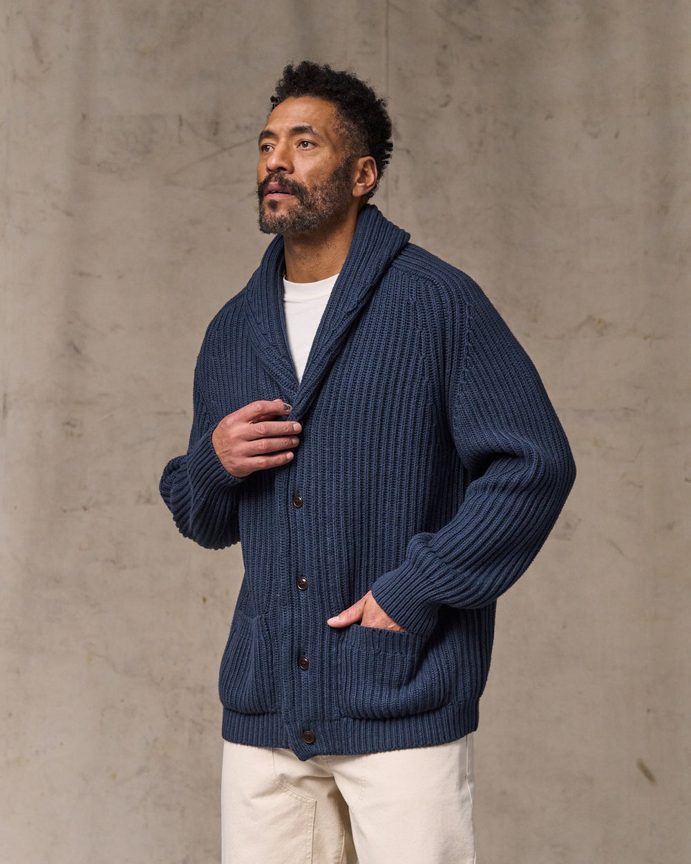 image of a model wearing Filson's Fisherman Rib Cotton Cardigan - Navy