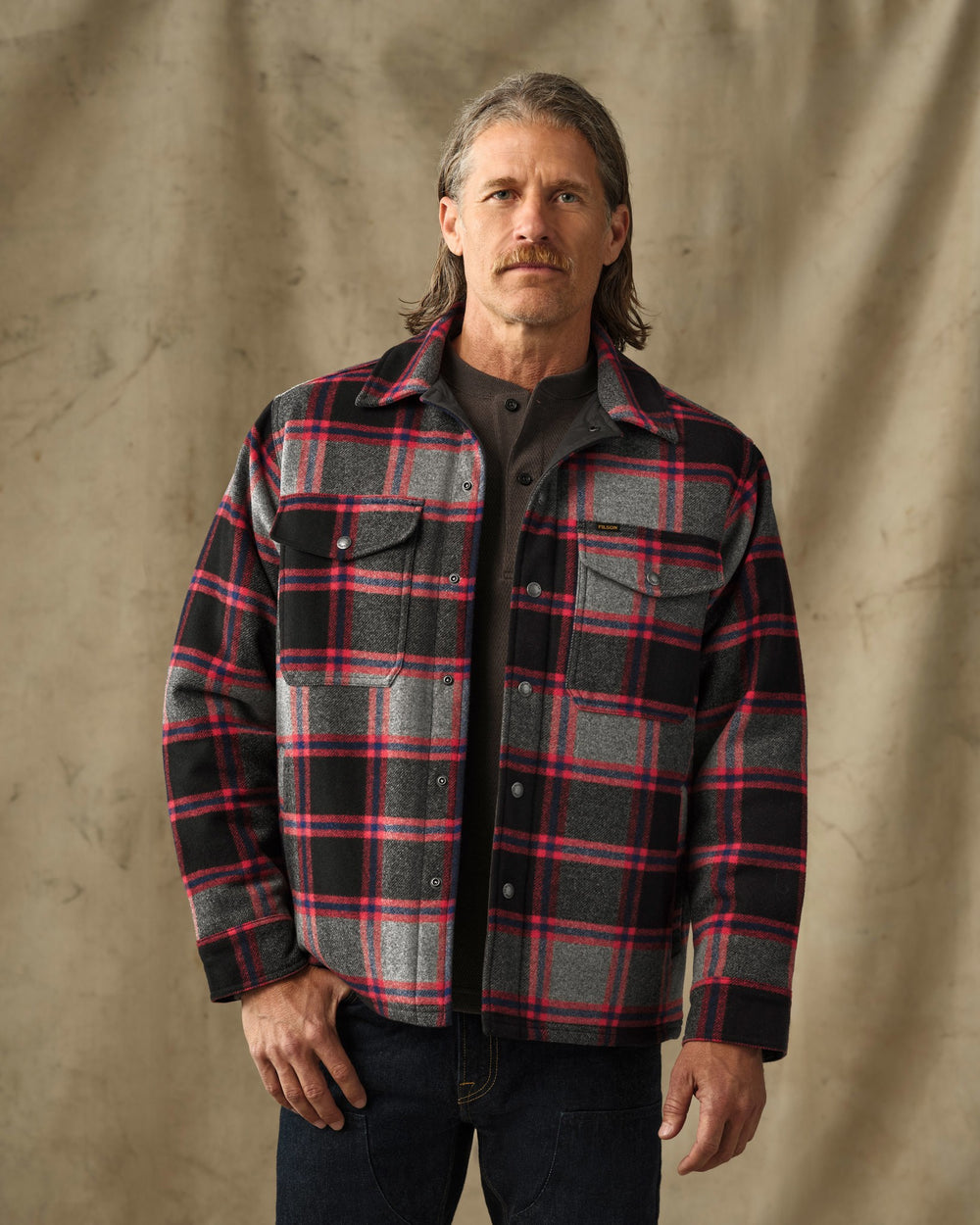 image of a model wearing Filson's Spokane Insulated Jac-Shirt - Gray / Red Plaid