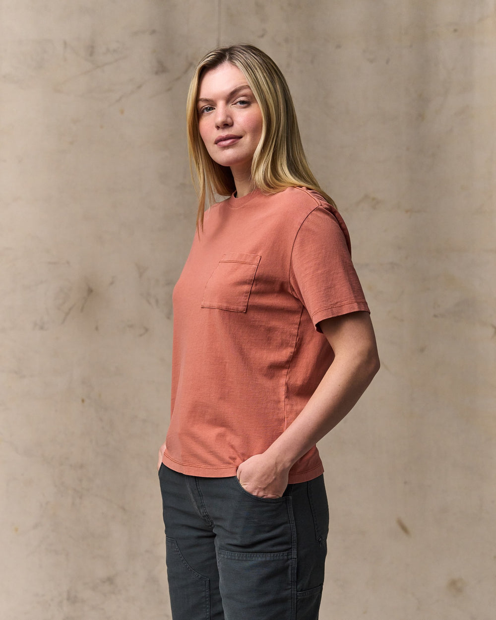 image of a model wearing Filson's Women's Short Sleeve Pocket Tee - Copper Brown