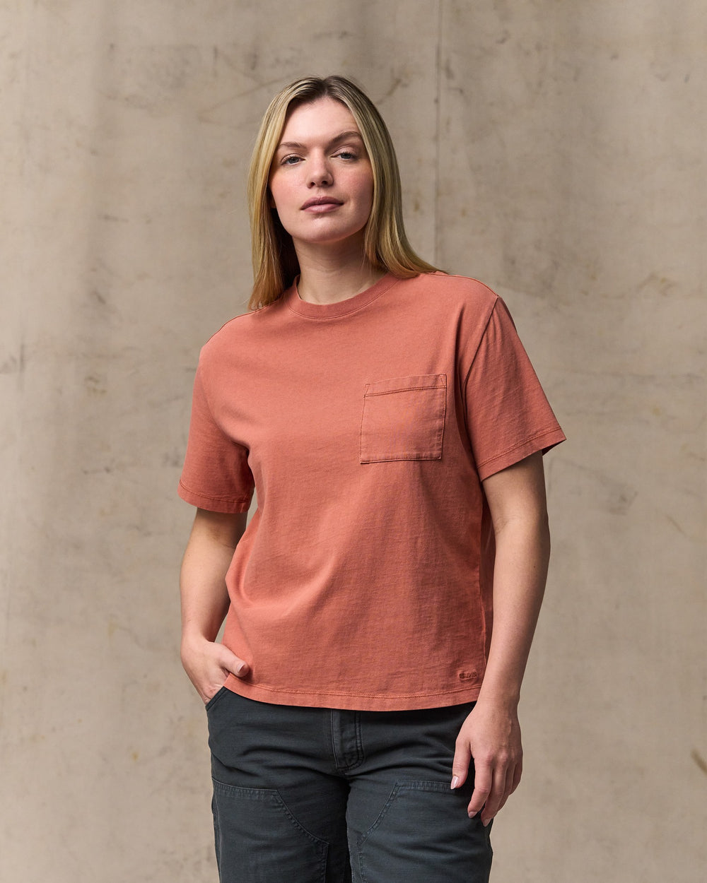 image of a model wearing Filson's Women's Short Sleeve Pocket Tee - Copper Brown