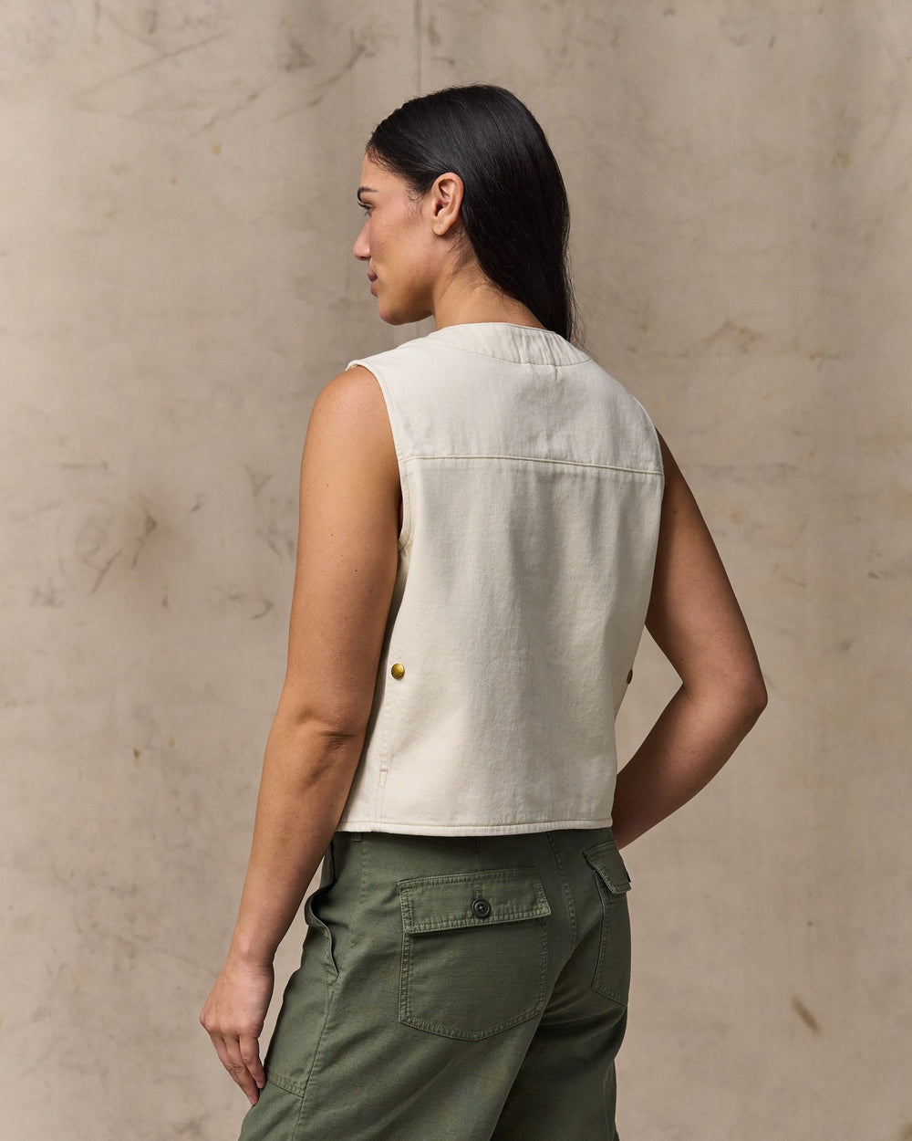 image of a model wearing Filson's Women's Archive Cruiser Vest - Natural Seed