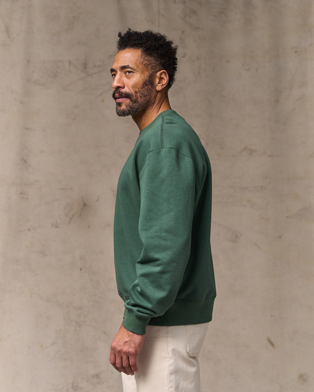 image of a model wearing Filson's Northwest Crewneck Sweatshirt - Granite Green