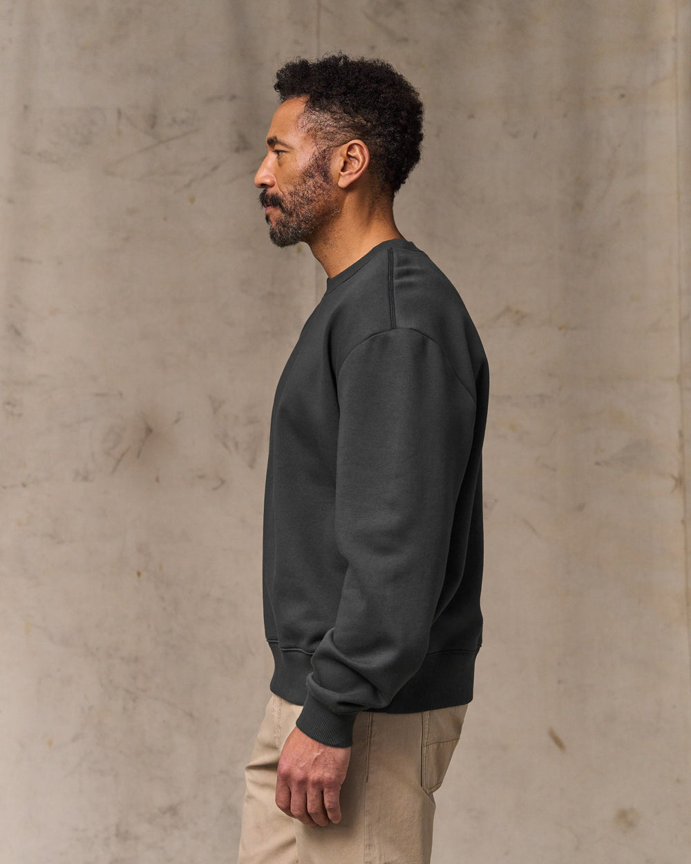 image of a model wearing Filson's Northwest Crewneck Sweatshirt - Faded Black