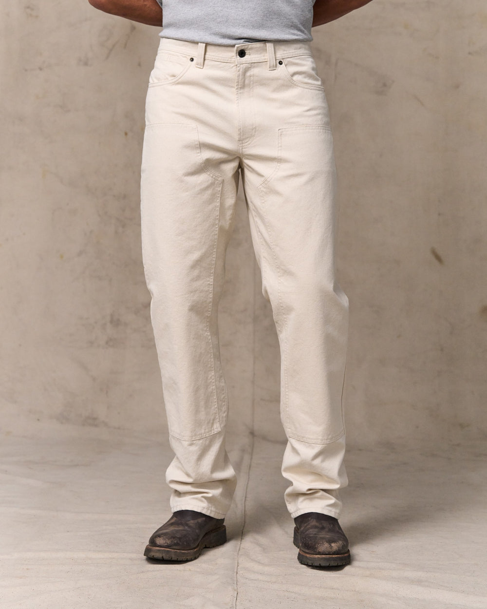 image of a model wearing Filson's Dry Tin Double Front Pants - Natural Seed