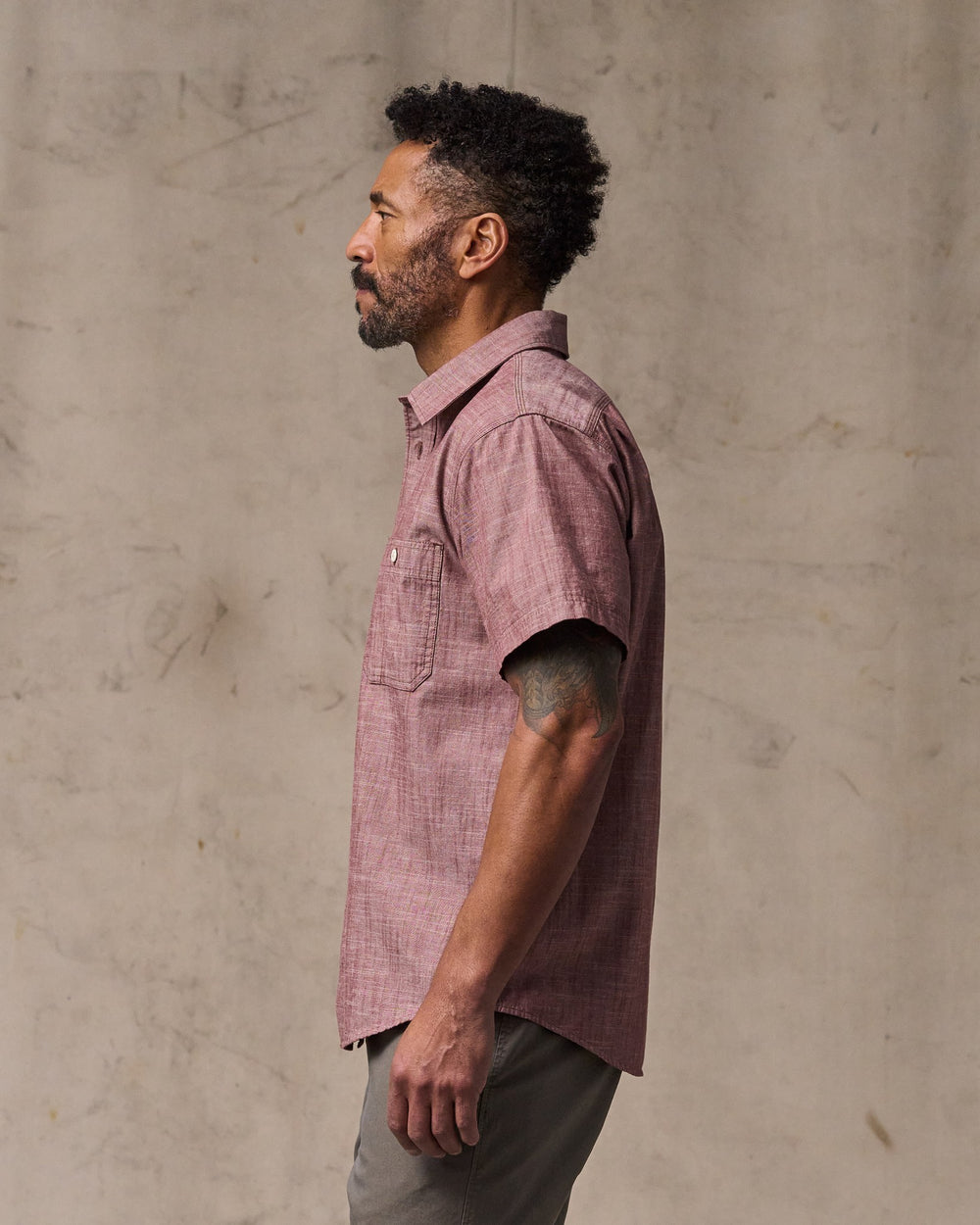 image of a model wearing Filson's Short Sleeve Chambray Shirt  - Sable