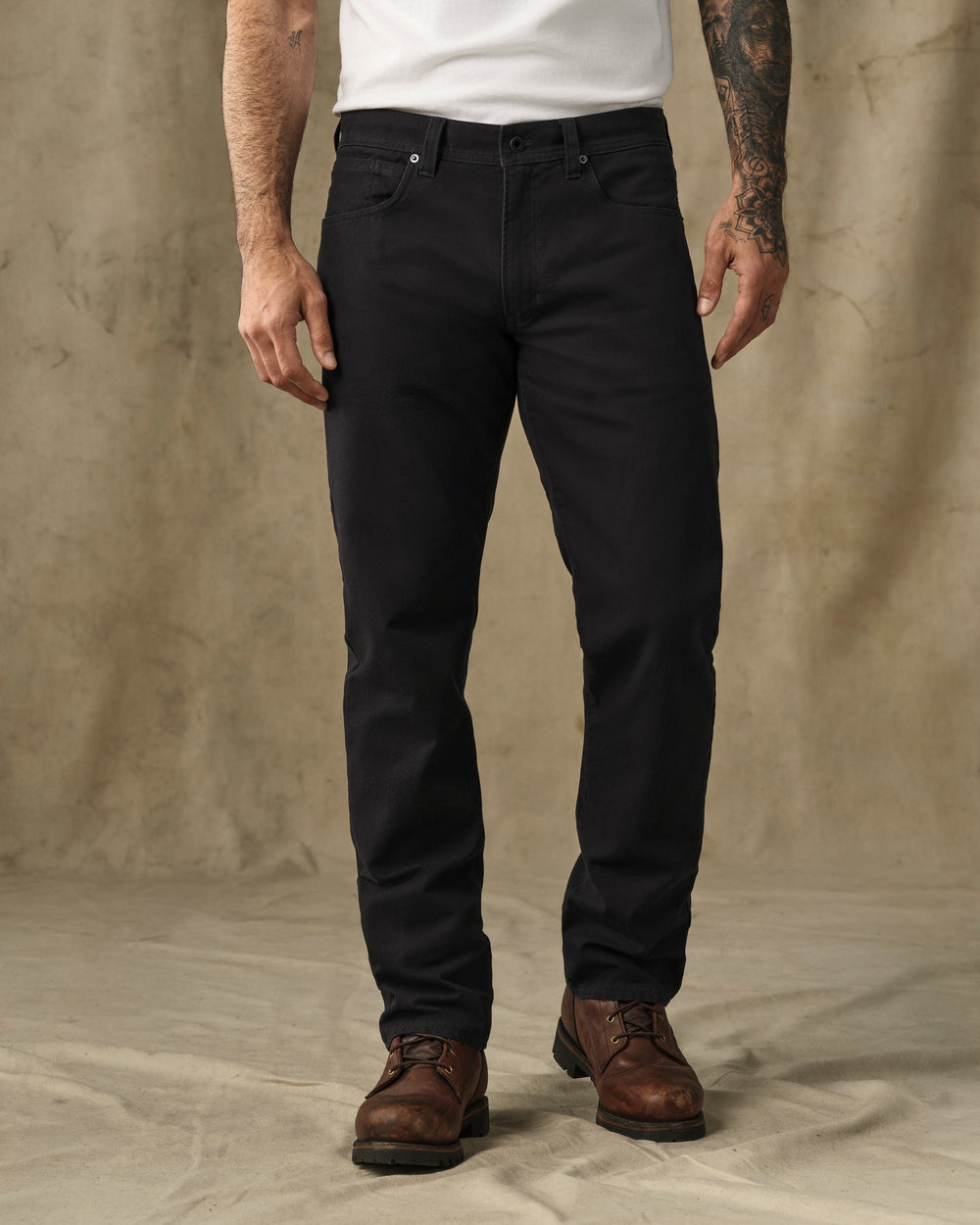 image of a model wearing Filson's Dry Tin Cloth 5-Pocket Pants - Black