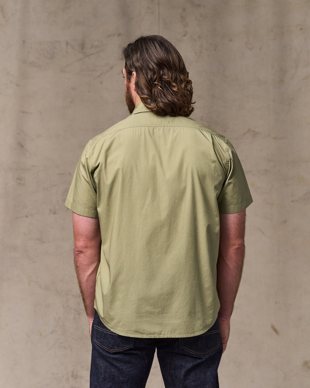 image of a model wearing Filson's Filson's Washed Short Sleeve Feather Cloth Shirt - Lakebed