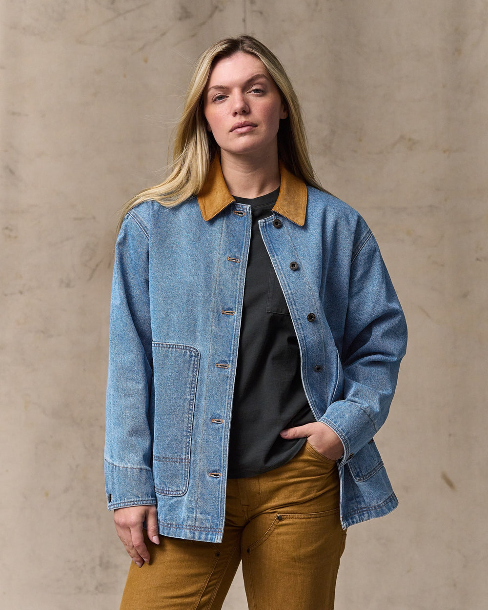 image of a model wearing Filson's Women's 11-oz. Denim Barn Coat - Light Indigo