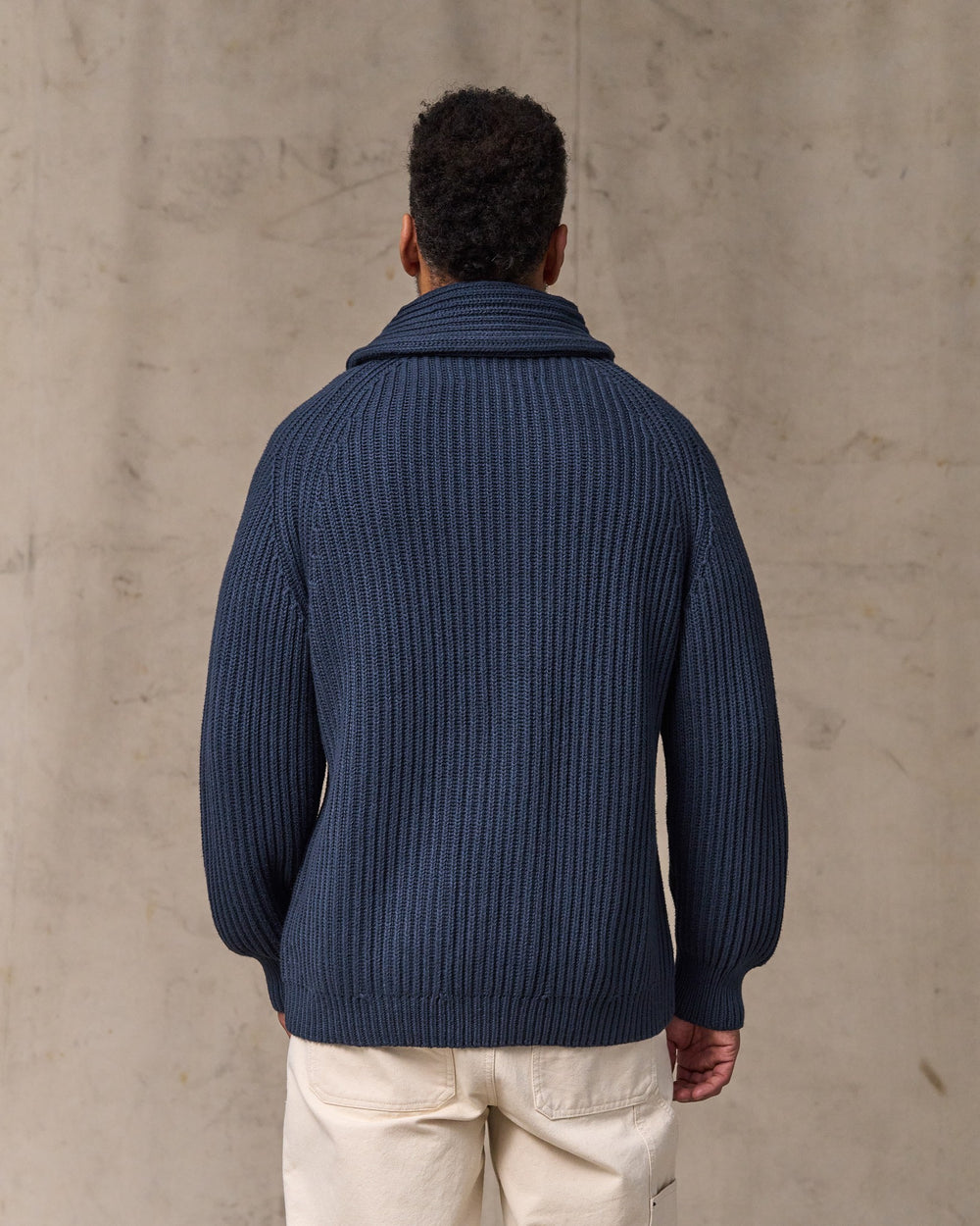 image of a model wearing Filson's Fisherman Rib Cotton Cardigan - Navy