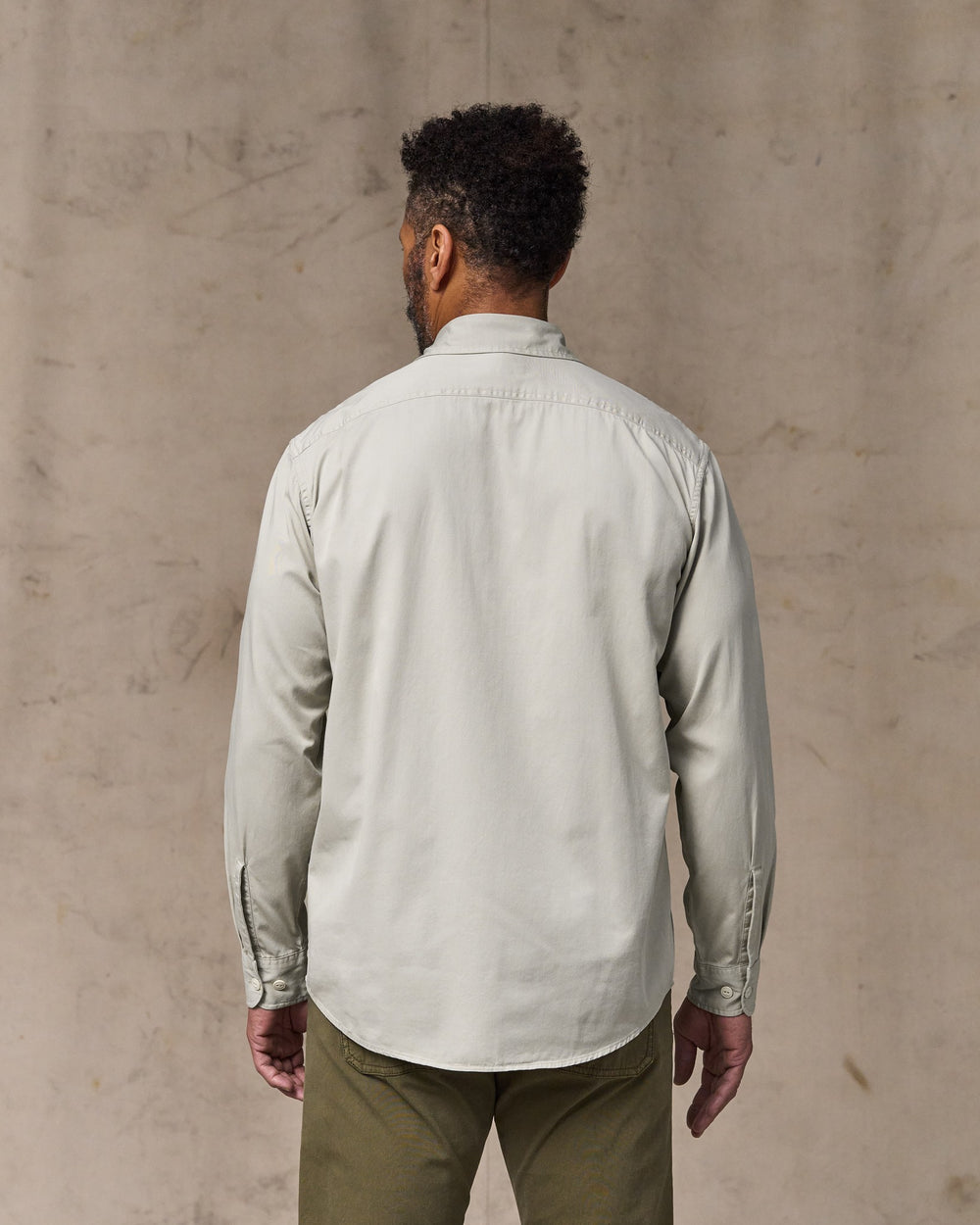 image of a model wearing Filson's 4.5-oz. Twill Shirt - Gray Sky