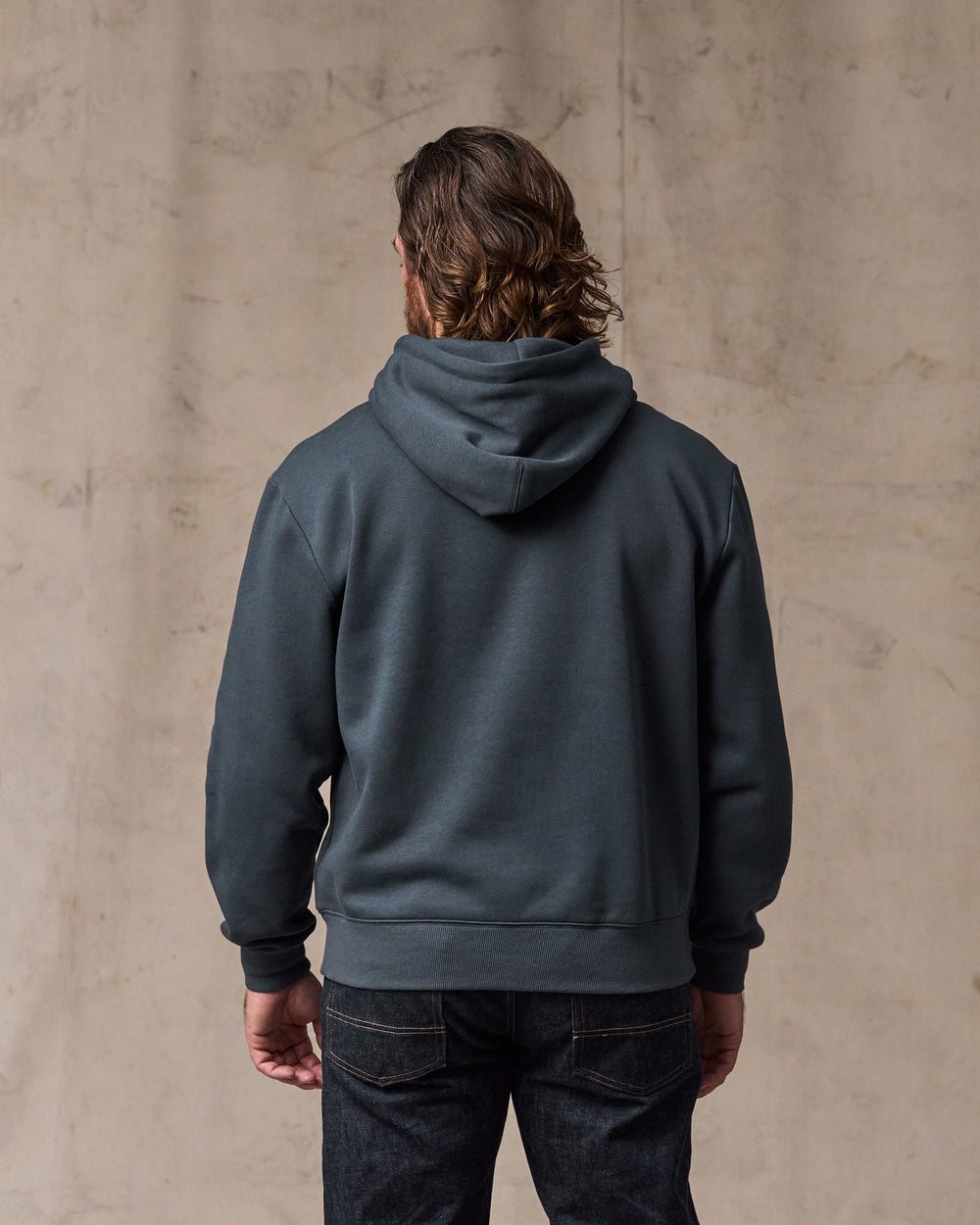 image of a model wearing Filson's Northwest Hoodie - Ink Blue