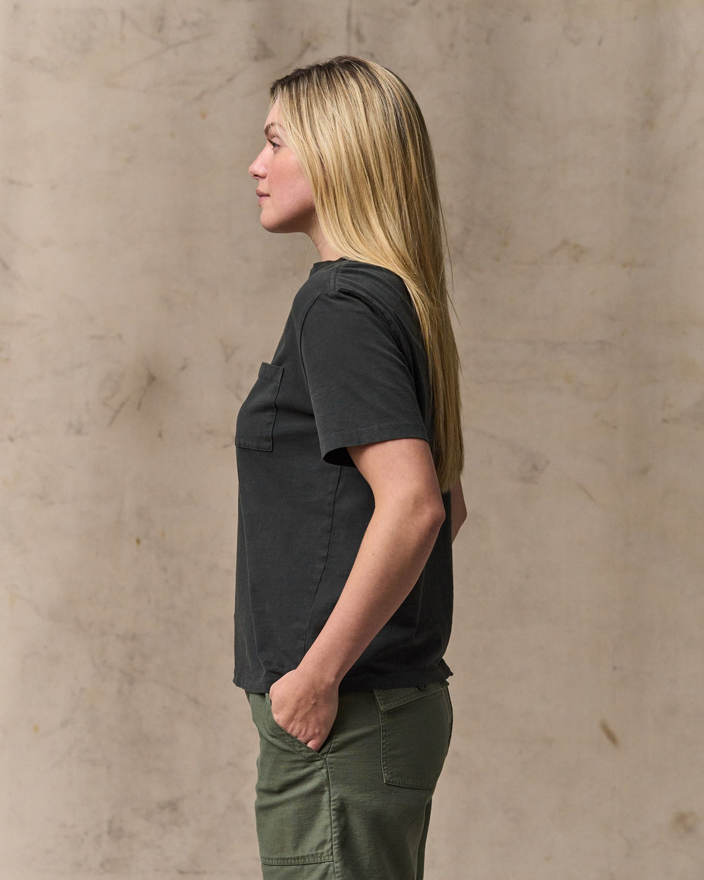 image of a model wearing Filson's Women's Short Sleeve Pocket Tee - Faded Black