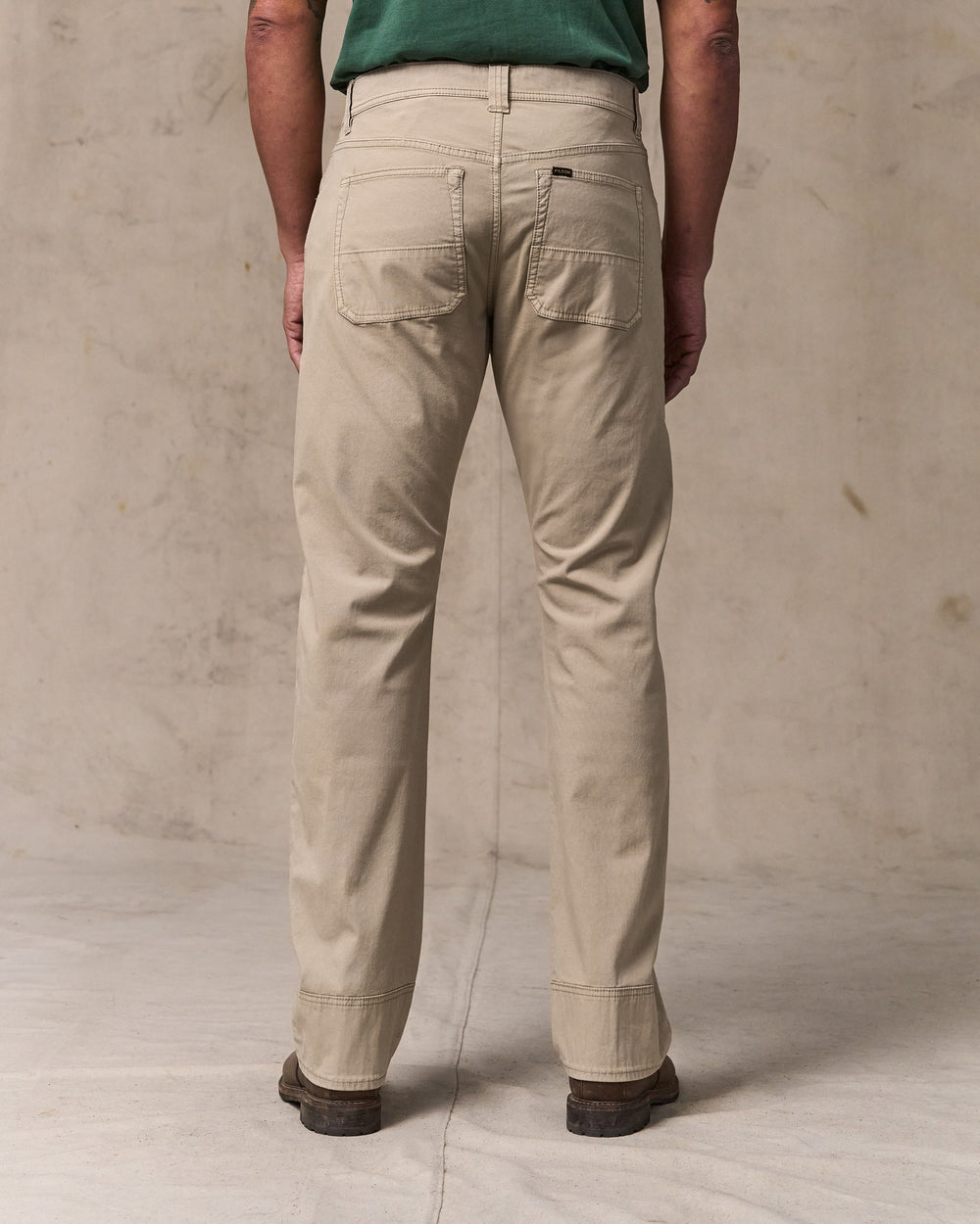 image of a model wearing Filson's Granite Mountain 5-pocket Pants - Buck Tan