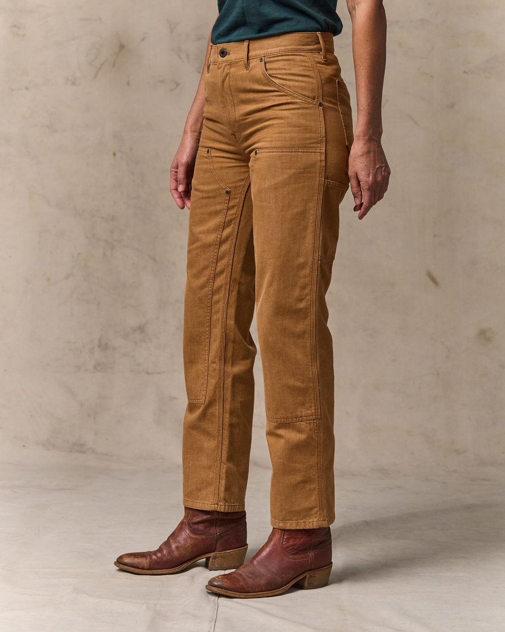 image of a model wearing Filson's Women's 11-oz. Work Jeans - Harvest Tan