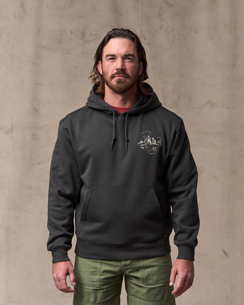 image of a model wearing Filson's Trout Graphic Hoodie - Faded Black